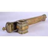 AN ANTIQUE MIDDLE EASTERN TRAVELLING INKWELL. 22 cm long.