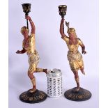 A LARGE PAIR OF ANTIQUE COLD PAINTED METAL CANDLESTICKS. 42 cm high.