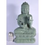 A LARGE MID 20TH CENTURY CHINESE CARVED JADE TYPE FIGURE OF A BUDDHA elegantly modelled upon a lotus