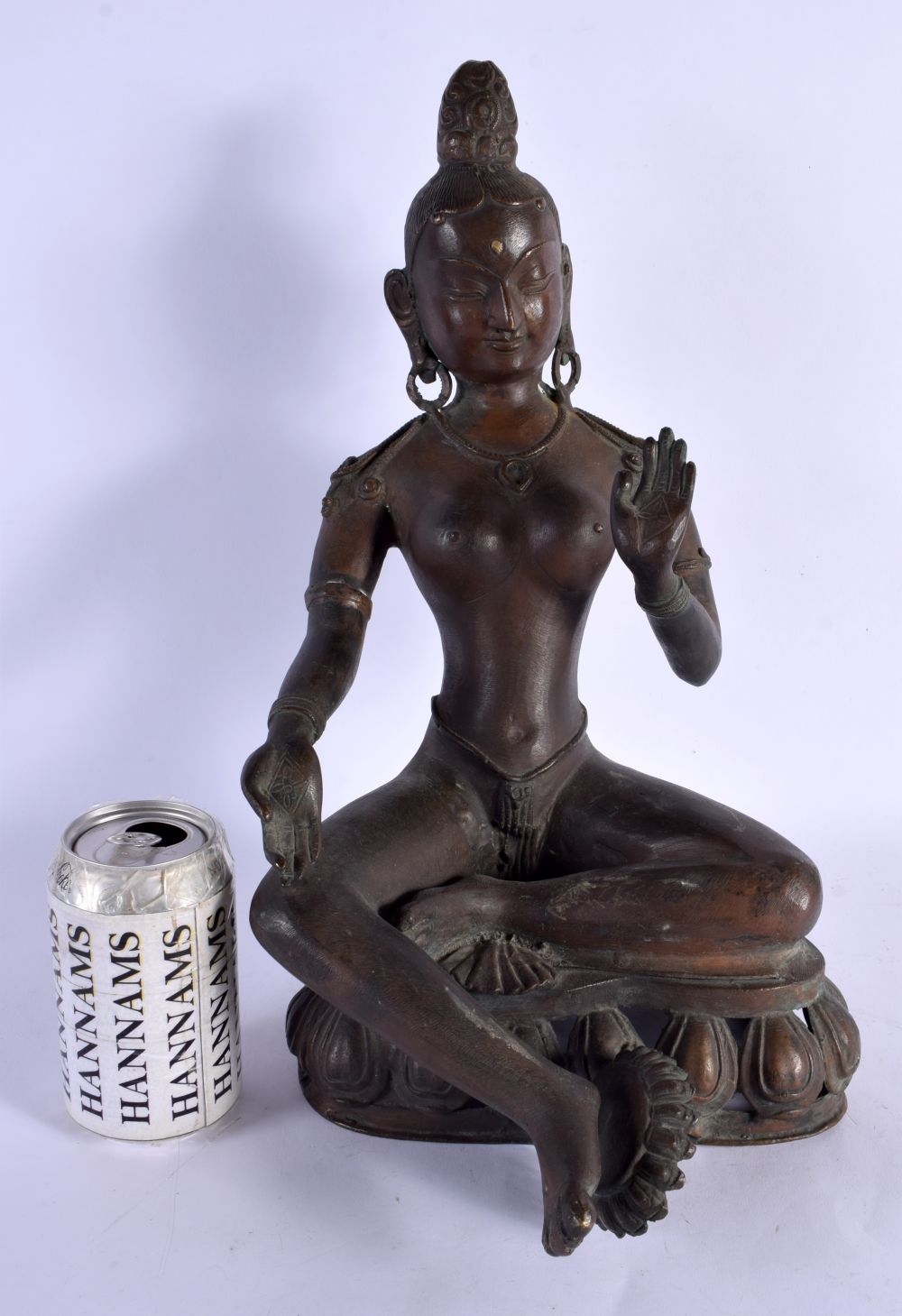 A LARGE 19TH CENTURY INDIAN BRONZE FIGURE OF A BUDDHA modelled with one hand raised. 35 cm x 22 cm.