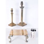 A pair of brass Empire style column lampstands together with an engraved brass stand largest 36 cm (