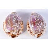 TWO CARVED SHELLS WITH ARABIC SCRIPT. 4.2cm x 7.3cm (2)