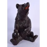 AN EARLY 20TH CENTURY BAVARIAN BLACK FOREST BEAR TOBACCO JAR. 23.5 cm high.