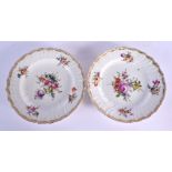 Early 19th c. pair of Berlin plates with ozier moulded border painted with flowers, sceptre mark in