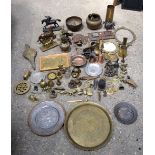 A huge collection of metal items, including brass and spelter. (Qty).