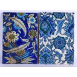 A PAIR OF OTTOMAN TURKISH MIDDLE EASTERN FAIENCE TILES painted with foliage. 23 cm x 15 cm.