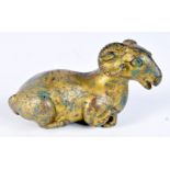 A small bronze gilded ram.9 x 14cm.