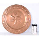 An Arts and Crafts copper charger 37 cm.