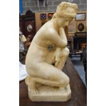 A FINE LARGE 19TH CENTURY ITALIAN CARVED MARBLE FIGURE depicting the crouching Venus 55 cm x 30 cm.