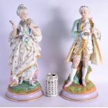 A LARGE PAIR OF 19TH CENTURY FRENCH PARIS PORCELAIN FIGURES modelled upon naturalistic bases. 48 cm