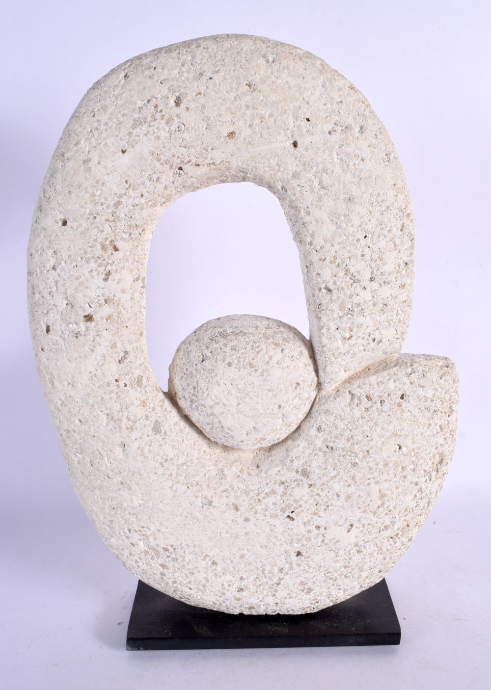 A LARGE CONTEMPORARY HOLLOWED STONE TYPE SCULPTURE. 33 cm x 20 cm.