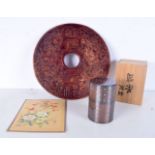 A large Chinese hardstone Bi Disc together with a Chinese enamelled metal canister and a Chinese pri