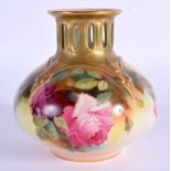 Royal Worcester vase with pierced neck painted with roses shape H306 date mark 1916. 10cm high