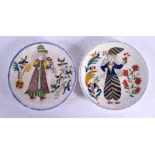 A PAIR OF TURKISH OTTOMAN KUTAHYA PLATES painted with figures. 13 cm diameter.