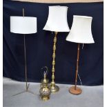 A collection of wooden and brass lamp stands and shades largest 168 cm (4 ).