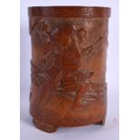 A FINE 19TH CENTURY JAPANESE MEIJI PERIOD CARVED BAMBOO BRUSH POT decorated with samurai fighting. 1