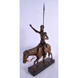 A VINTAGE CARVED WOOD FIGURE OF A MALE UPON A HORSE. 45 cm high.