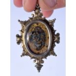 A RARE 16TH/17TH CENTURY EUROPEAN GILT CASED RELIQUARY painted with figures within a swirling border