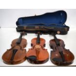 Three violins, two cased. Labelled - Stradivarius. Largest 34cm (3).