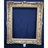 A FINE LARGE ANTIQUE GILTWOOD FRAME formed with acanthus and scrolling vines. 120 cm x 96 cm.