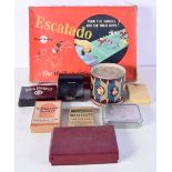 A collection of vintage board games and playing cards including Escalado, Bezique, Manifesto, etc. L