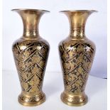 A PAIR OF MIDDLE EASTERN BRASS NIELO VASES. 20.5 cm high.