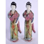 A PAIR OF EARLY 20TH CENTURY CHINESE FAMILLE ROSE PORCELAIN FIGURES Late Qing/Republic. 21 cm high.