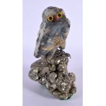 A CONTINENTAL CARVED STONE OWL. 14 cm x 7 cm.