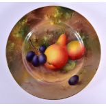 Royal Worcester plate painted with fruit by H. Ayrton, signed, date code 1929. 15.5cm diameter.