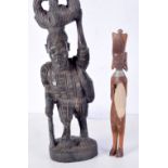 A large African hardwood tribal figure together with a smaller wooden figure 43 (2).