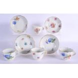 FOUR MEISSEN PORCELAIN CUPS AND SAUCERS painted with flowers. 10 cm wide. (8)