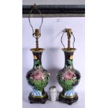 A PAIR OF EARLY 20TH CENTURY CHINESE CLOISONNE ENAMEL VASES converted to lamps. 56 cm high overall.