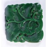 A Chinese carved Jade boulder in the form of a fruiting pod 7.5 x 7.5 cm.