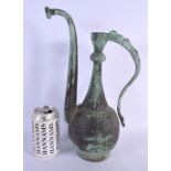 A LARGE MIDDLE EASTERN BRONZE EWER. 36 cm x 14 cm.