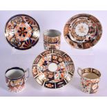 THREE 19TH CENTURY DERBY IMARI PORCELAIN CUPS AND SAUCERS in various forms and sizes. (6)