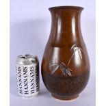 A 19TH CENTURY JAPANESE MEIJI PERIOD BRONZE VASE silver inlaid with bamboo. 25 cm x 12 cm.