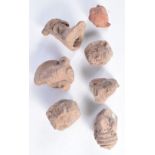A collection of early Indian carved stone fragments largest 9 cm .(7).