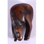 A FINE 18TH/19TH CENTURY JAPANESE EDO PERIOD CARVED BOXWOOD NETSUKE modelled as a horse. 5.5 cm x 2.