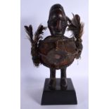 A LARGE EARLY 20TH CENTURY AFRICAN TRIBAL CARVED WOOD FERTILITY FIGURE modelled with attached feathe