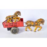 A MARX TIN PLATE HORSE AND CARRIAGE. 28 cm wide.