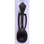 AN AFRICAN TRIBAL CARVED WOOD SPOON. 17 cm long.
