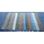 A hand tufted wool rug 150 x 236 cm.
