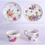 A MEISSEN PORCELAIN CUP AND SAUCER together with a similar Dresden example. 11 cm diameter. (4)