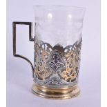 AN ANTIQUE RUSSIAN WHITE METAL NIELLO CUP HOLDER. 209 grams inc glass. 12 cm x 9 cm.