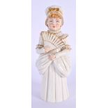 Royal Worcester candlesnuffer modelled as the Town Girl, holding an open fan, date mark 1892. 12cm h