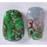 TWO CHINESE JADE PENDANTS. Largest 5.4cm x 3.7cm x 1.2cm (2)