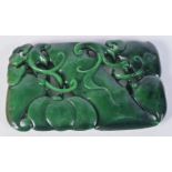 A Chinese carved Jade boulder in the form of a fruiting pod 11.5 x 7 cm.