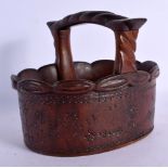 A RARE PITCAIRN ISLANDS CARVED WOOD BASKET by Jacob Warren. 17 cm x 15 cm.