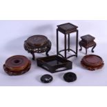 A COLLECTION OF CHINESE AND JAPANESE STANDS in various forms and sizes. (qty)