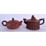 TWO EARLY 20TH CENTURY CHINESE YIXING POTTERY TEAPOTS AND COVERS Late Qing/Republic. Largest 16 cm w